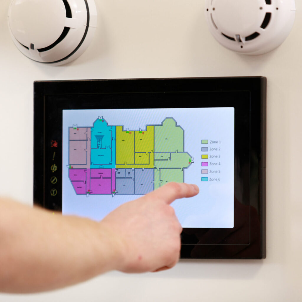 A touch screen showing a map of fire alarm system zones